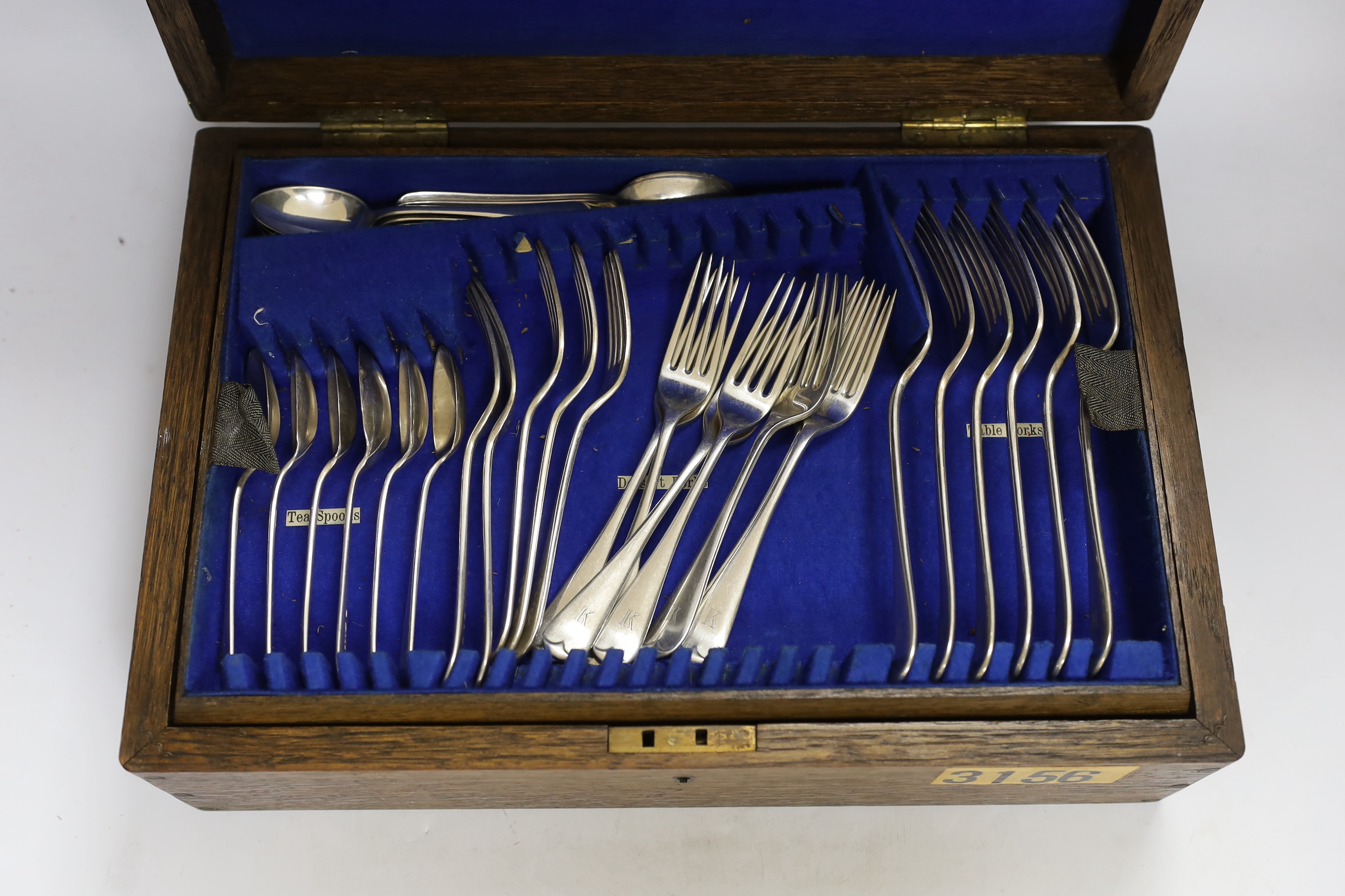 An oak canteen of plated cutlery